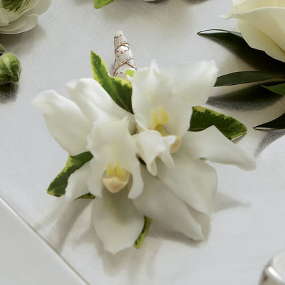 White Mini Cymbidium Boutonniere –  Leekers Floral, Park City KS